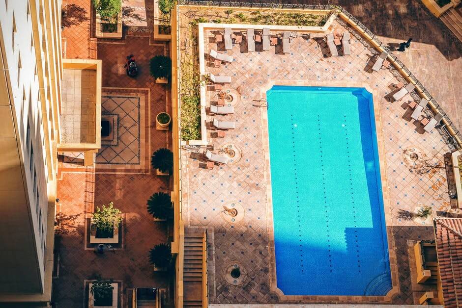 Patio Design Ideas for Pools Owners | Clear Comfort AOP Pool System
